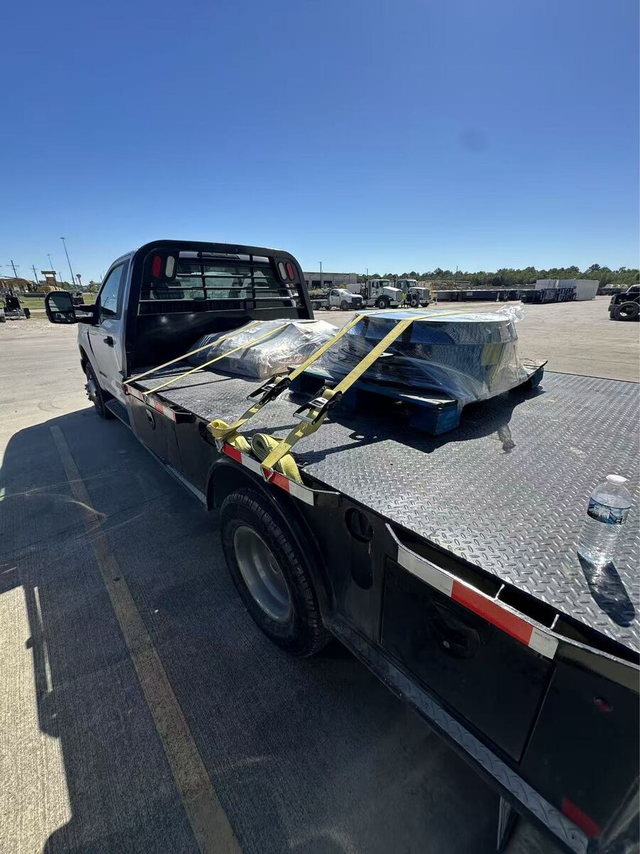 Blind flanges strapped to a flatbed truck for same-day dispatch from our Houston facility
